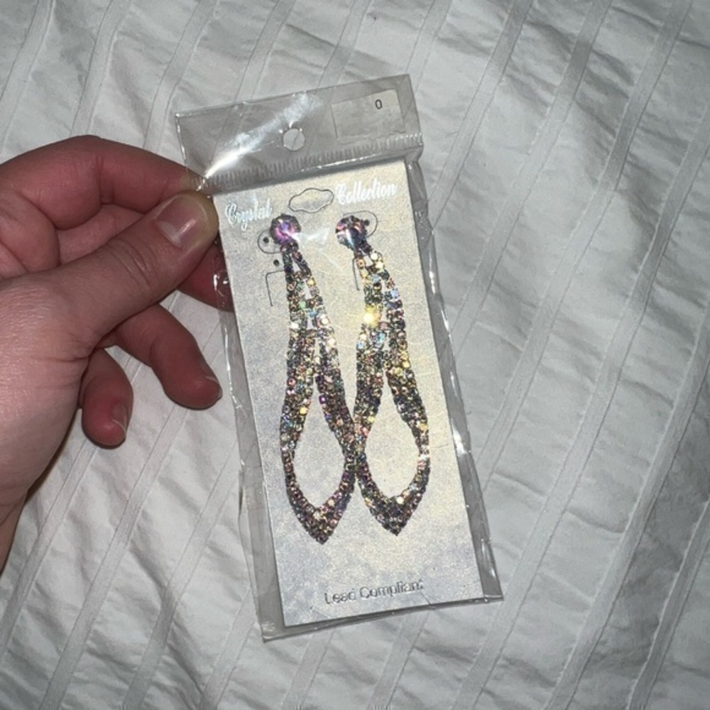 New Crystal Collection silver and grey colored bedazzled long earrings